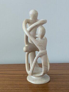 A Timeless Symbol of Connection Vintage Modern Circle of Love Family Sculpture